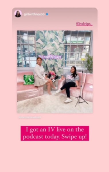 Two women sitting in a stylish pink room decorated with leaf-patterned wallpaper, discussing on a podcast setup, with social media overlays.