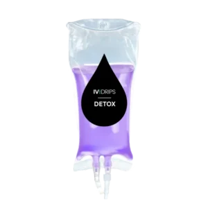 A clear IV bag filled with purple liquid labeled "Hydration Drip" against a plain background.