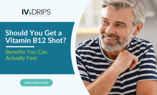 A smiling middle-aged man in a striped shirt sits at a table. Next to him, text reads, Should You Get a Vitamin B12 Shot? Benefits You Can Actually Feel, with the IV Drips logo and website link above.