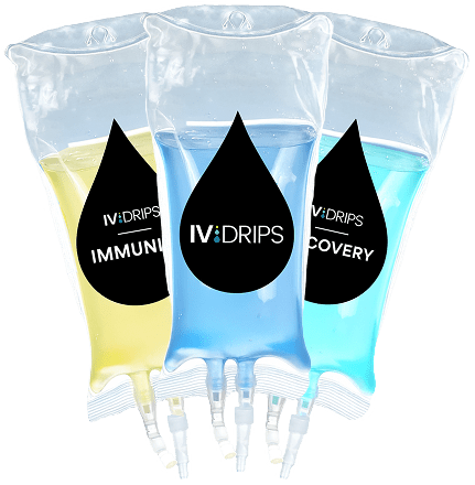 Three IV bags filled with yellow and blue fluids, each labeled IV DRIPS. The bags are marked for IMMUNE and RECOVERY purposes, suggesting health and wellness treatments.