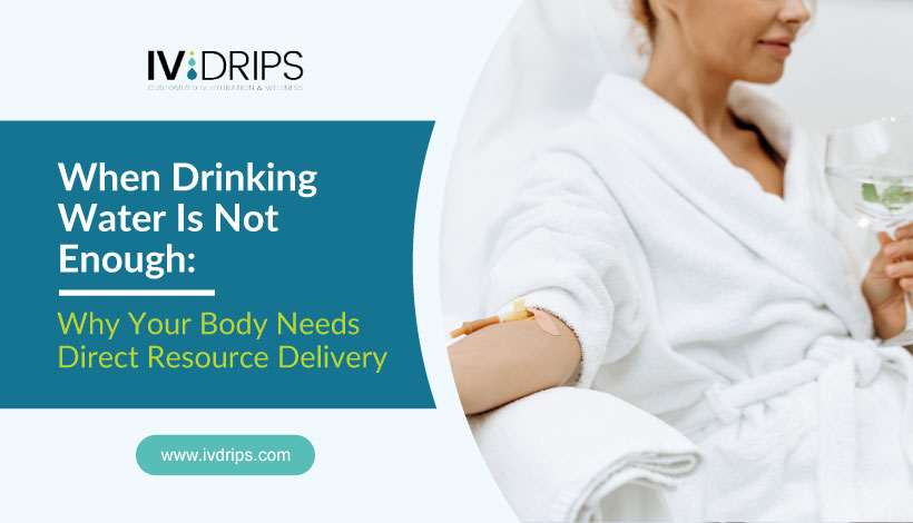 A woman in a white robe receives an IV drip in her arm while holding a glass of water. Text on the image reads: “When Drinking Water Is Not Enough: Why Your Body Needs Direct Resource Delivery. www.ivdrips.com.”.