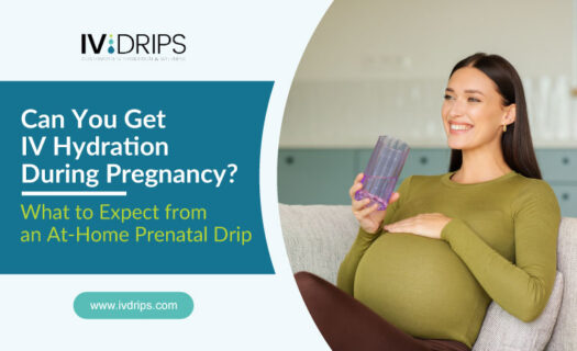 Pregnant woman sits on a couch, smiling and holding a glass of water. The text discusses IV hydration during pregnancy and what to expect from an at-home prenatal drip.